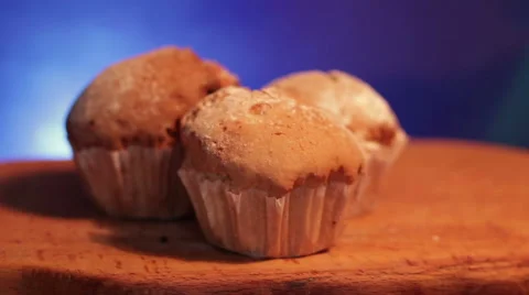 A desk with cupcakes Stock Footage 60591609