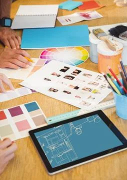 Desk with design tools and tablet with office lines (two-tone: blue and light Stock Photos