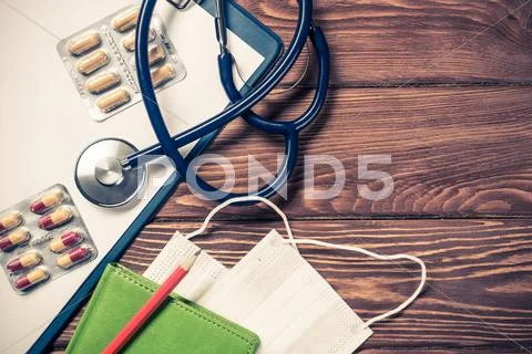 Desk of doctor with medicine things Stock Photos