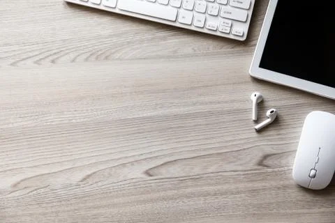 Desk flat lay view with keyboard, mouse and tablet pc Stock Photos