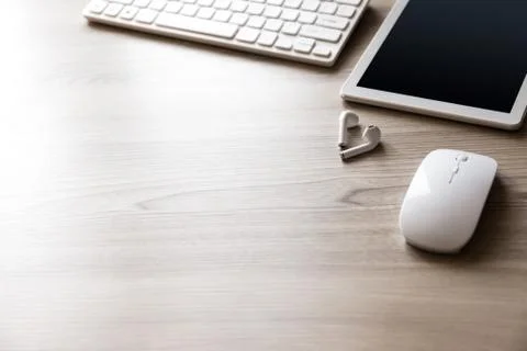 Desk flat lay view with keyboard, mouse and tablet pc Stock Photos