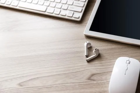 Desk flat lay view with keyboard, mouse and tablet pc Stock Photos