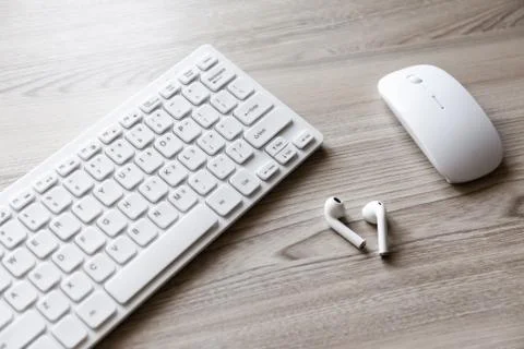 Desk flat lay view with keyboard, mouse and headphones Stock Photos