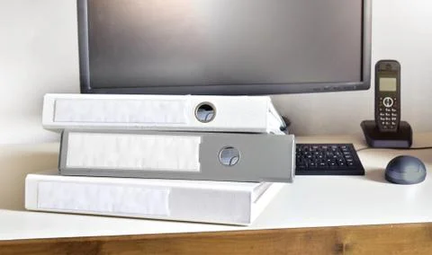 Desk folder data privacy pc telephone files keyboard job office Stock Photos
