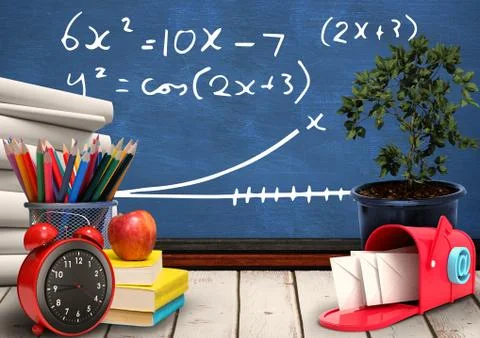Desk foreground with blackboard graphics of math equations Foto stock
