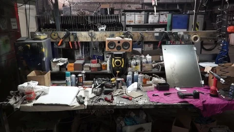 Desk of free space and workshop. Clip. Organized wall of tools and electricity Stock Footage 95389058