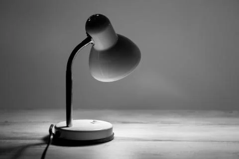 Desk lamp on table Stock Photos