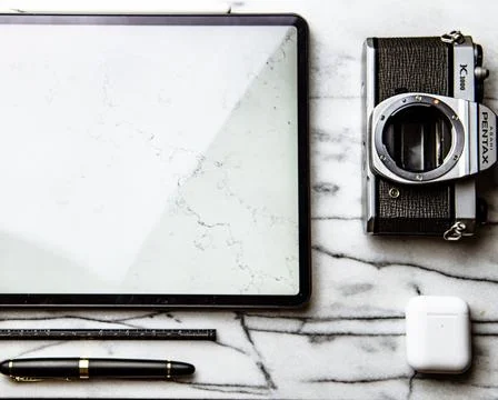 Desk with multiple objects on it Stock Photos