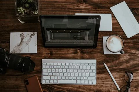 Desk with multiple objects on it 스톡 사진