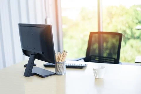 Desk in office with computer desktop pencils and coffee cup for designer de.. Stock Photos