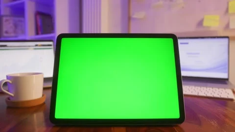Desk of programmer with gadget chroma key green screen, person working with Stock Footage 303555534