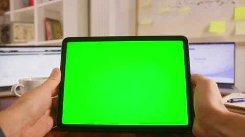 Desk of programmer with gadget chroma key green screen, person working with Stock Footage 316400344