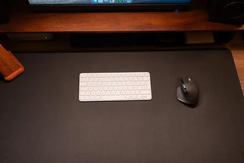 Desk setup with wireless keyboard and mouse Stock Photos