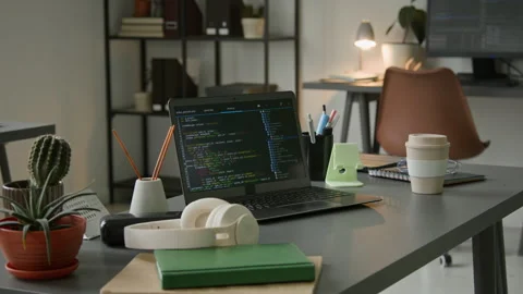 Desk of Software Developer with Laptop and Code in Company Office Stockbeeldmateriaal 335936946