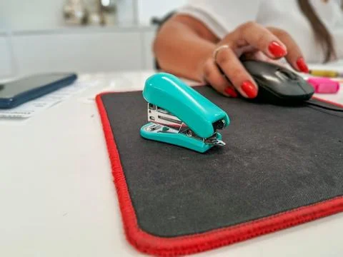 Desk with stapler and mouse Stock Photos