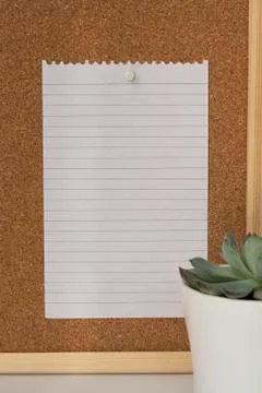 Desk table, work space. Cork board. Empty paper pages for notes. Stock-Fotos