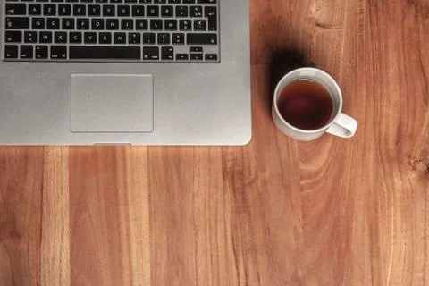 Desk view in the office, computer and coffee, top view, copy space Stock Photos