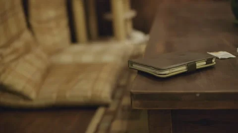 Desk, yellow light, E-ink reader Stock Footage 194465170