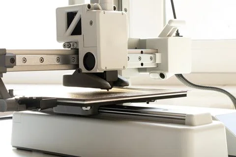 A desktop 3D printer on a white background. Modern technologies for additiv.. Stock Photos