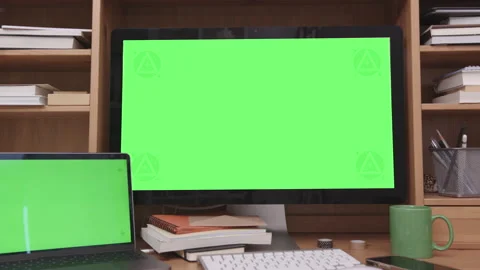 Desktop and Laptop Computers with Green Screen in Home Office Interior Stock Footage 172299664