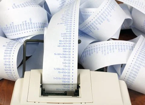 Desktop calculator with tape for computing costs, expenses, reve Stock Photos