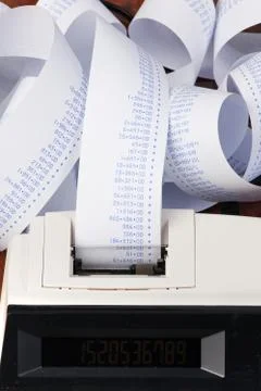 Desktop calculator with tape for computing costs, expenses, reve Stock Photos