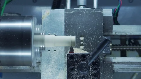 Desktop CNC lathe cutting chess pawn out of wood stock real time part 2 Stock-Footage 118666344
