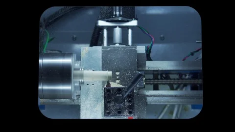 Desktop CNC lathe cutting chess pawn out of wood stock real time part 2 Stock-Footage 118666498