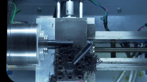 Desktop CNC lathe cutting chess pawn out of plastic stock real time part 2 Stock-Footage 118666804