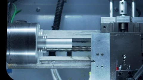 Desktop CNC lathe face cutting aluminum stock medium shot Stock Footage 118666482