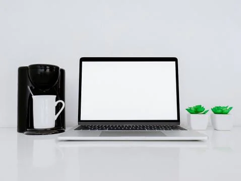 Desktop Coffee Maker with Laptop Concept Stock Photos