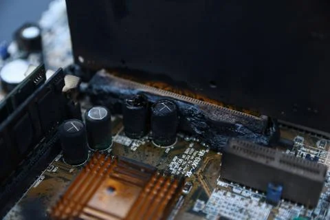Desktop Computer Burned Damage after fire Burning CPU GPU video card, memory, Fotos Stock