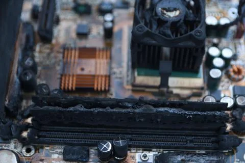 Desktop Computer Burned Damage after fire Burning CPU GPU video card, memory, Stock Photos