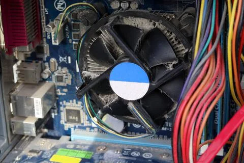 The desktop computer is covered in dust. Dust on the computer board. The CPU  Stock Photos
