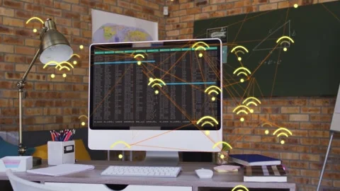 Desktop computer displaying dense text starting wifi glyphs and nodes showing Stock Footage 331789852