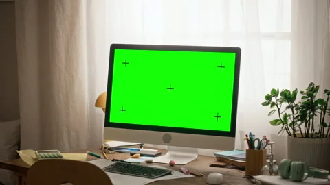 Desktop Computer with Green Screen Displaying for Online Learning Stock Footage 347124964