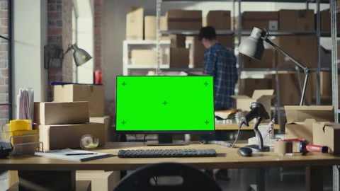 Desktop Computer with Green Screen in Warehouse Video stock 222960387