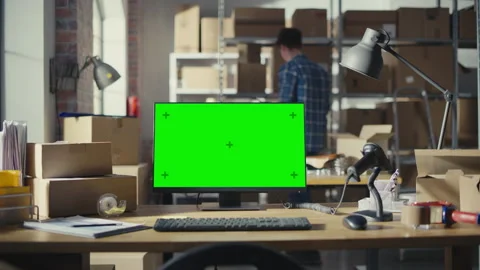 Desktop Computer with Green Screen in Warehouse Video stock 222960408