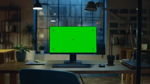 Desktop Computer with Mock-up Green Screen Standing on the Desk in Office Stock Footage 111333286
