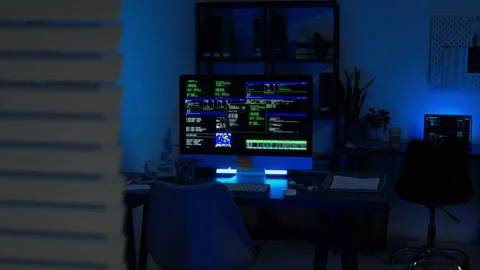 Desktop Computer Running Software Code in Cybersecurity Office Stock Footage 347285508