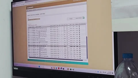 A desktop computer screen displaying a spreadsheet or data table Stock Footage 311589575
