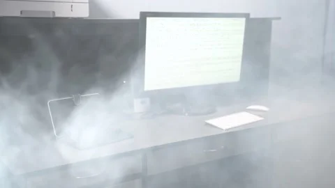 Desktop computer on smoke. Overheated electronics smoke hardware failure. Smoke Stock Footage 131895743