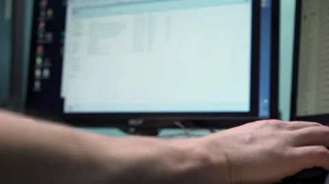 Desktop computer used along with smart phone 4k Stock Footage 58772252