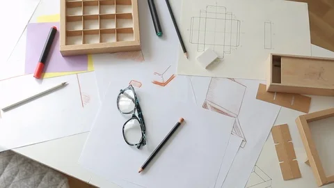Desktop designer paper packaging. Development of a cardboard box layout. Stock Footage 116617461