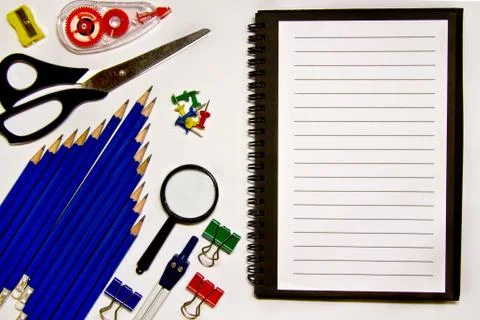 Desktop flat scene with white open planner, desktop desk accessories Stock Photos