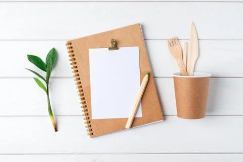 Desktop mockup planner. Flat lay of white wooden table background. Top view g Stock Photos