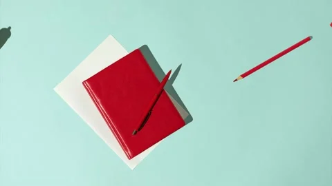 Desktop in the office with a notebook and a pen and pencil. Stock Footage 220601090