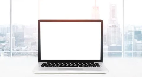 Desktop with panoramic view Laptop on table in office with panoramic view ... Stock Photos