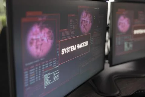 Desktop screen filled with system hack warning notification Stock Photos