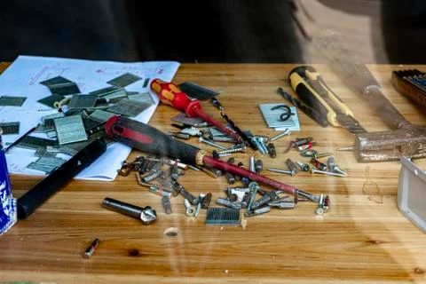 Desktop in the workshop, tools lie on the table in the workshop. workshop table Stock Photos